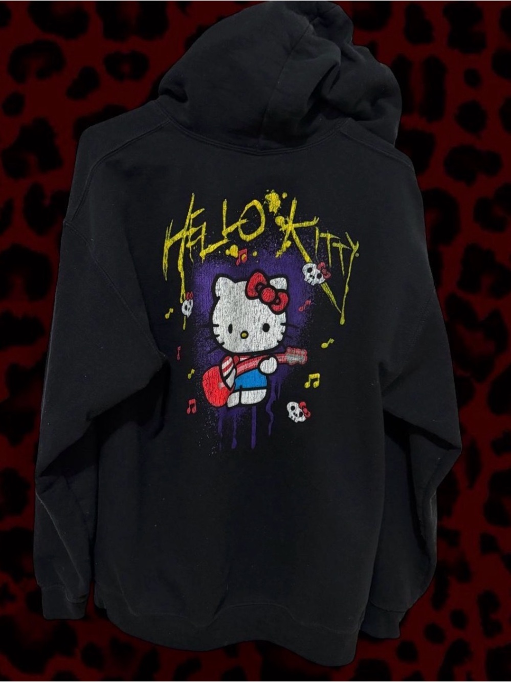 Hello Kitty Black Pullover Hoodie with Colorful Rock Graphic